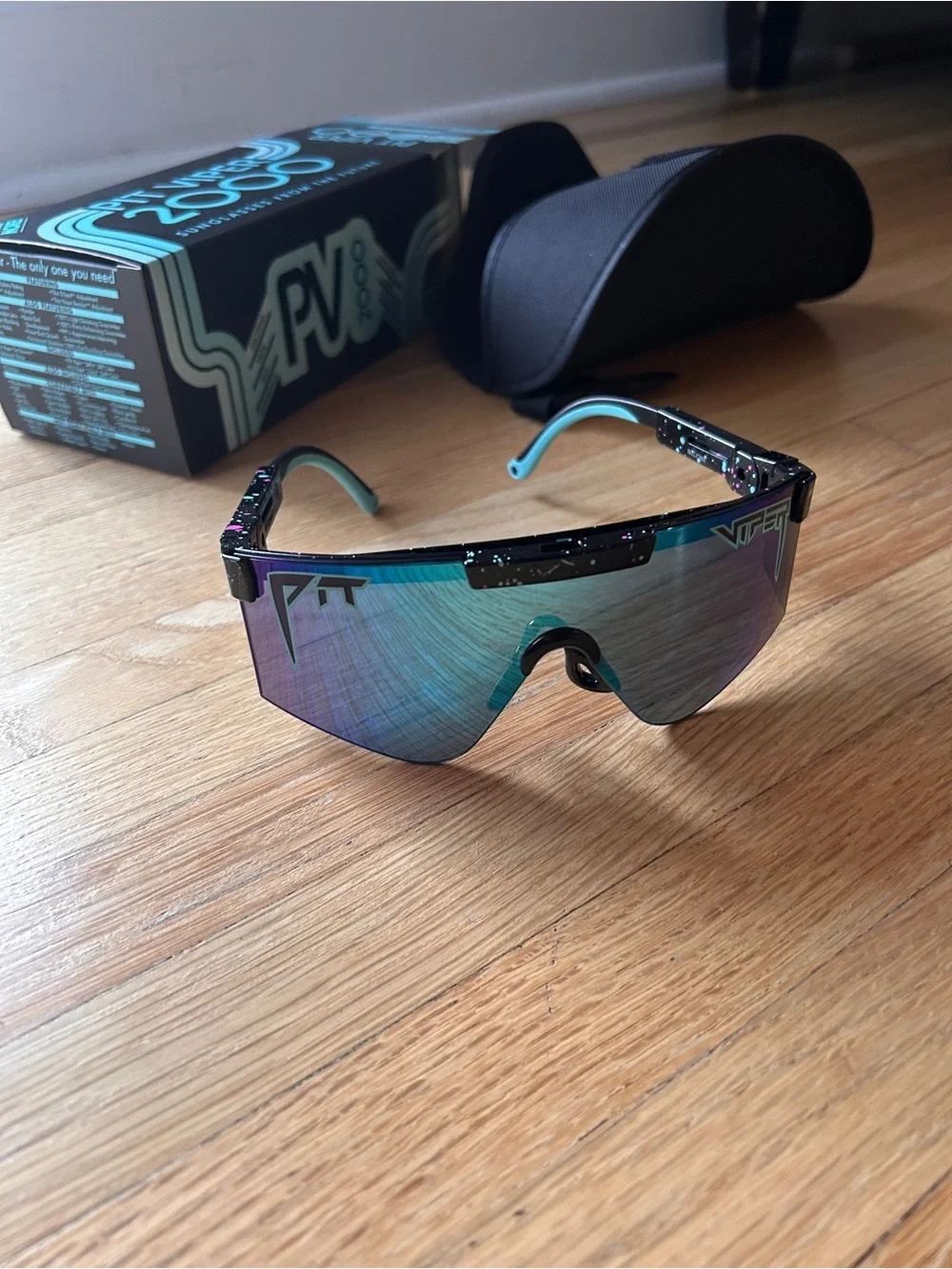 Pit Viper Shield Sunglasses in Teal and Purple Mirror